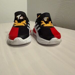 Adidas Kids' Red and Black Sneakers with Yellow Laces